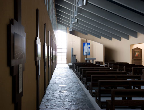 L'interno dell'aula, segnato dal percorso passante tangenziale e luminoso, cui si affiancano la emi-navata e l'emi-abside